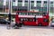 Rows of buses and taxis drive along Oxford Street in London. Oxford Street is one of London`e busiest streets.