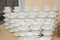 Rows of coffee or tea cups for background