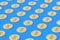 Rows of coins with dollar symbol on blue background. Financial indicators