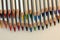 Rows of colored pencils, background