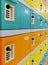Rows of colorful safety boxes -  orange, yellow and green