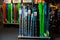 Rows of colourful skis in sport equipment store