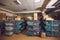 Rows of containers full of shoe lasts standing in a warehouse of a footwear factory