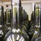 rows of dark glass bottles for wine, winemaking concept