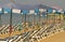 Rows of Empty Beach Chairs and Umbrellas