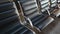 Rows of empty chairs in an airport lounge