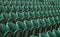 Rows of empty green spectators` chairs at Wimbledon All England Lawn Tennis Club.