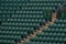 Rows of empty green spectators` chairs at Wimbledon All England Lawn Tennis Club.