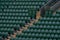 Rows of empty green spectators` chairs at Wimbledon All England Lawn Tennis Club.