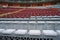 Rows of empty orange and white seats in the sports complex of the Estadio Nacional - Soccer Stadium - in Lima Peru