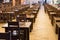 Rows of empty tables and chairs in a restaurant, cafe. Quarantine during coronavirus.