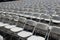 Rows of folding white chairs