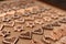 Rows of ginger cookies shaped like hearts, stars, and horseshoes. Valentine\\\'s Day, Christmas background. Selected focus