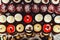 Rows of italian mignon cakes on a glass stand