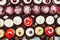 Rows of italian mignon cakes on a glass stand