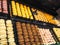 Rows of macarons on display in French patisserie