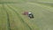 The rows making from dry hay before baling