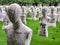 Rows of Mannequins with people names on a grass background
