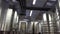 Rows of modern Stainless steel tanks in winemaker factory