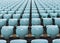 The rows of numbered turquoise chairs stretching into the distance