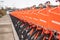 Rows of orange ride sharing bikes