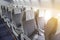 Rows of passenger seats in the cabin airplane.