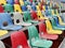 Rows of plastic colorful seats at a stadium