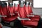 Rows of red seats in train