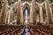 Rows of seats against the backdrop of columns in the Duomo. Italy, Milan.