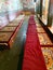 Rows of seats for prayer in a Buddhist temple