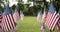 Rows of slow waving US American flags blowing in the wind. Patriotic concept for USA holidays, 4th of July, Memorial day, or