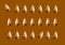 Rows of Soft Serve Ice Cream Cones Pattern on Brown Background