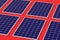 Rows of solar panels on red background. Global ecological trend