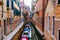 Rows of traditional pretty houses on the canal in Venice, Italy