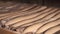 Rows of uncooked dough loaves in bread production factory to next phase of baking.