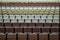 Rows of vacant spectators seats in theater. Abstract background