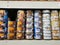 Rows of variety canned food product on shelves