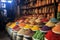 rows of vibrant spices and herbs in a spice market