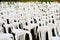 Rows of White Plastic Outdoor Chairs