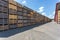 Rows of wooden crates boxes and pallets for fruits and vegetables in storage stock. production warehouse. Plant Industry