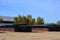 Rows of Wooden shedrow stabling at Twin Rivers Ranch