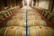 Rows of wooden wine barrels