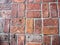 Rows of worn bricks in distinct pattern