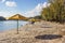 Rows of yellow umbrellas on the beach