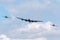 Royal Air Force Battle Of Britain Memorial Flight Avro Lancaster bomber PA474 flying in formation with two Supermarine Spitfires.