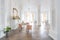 royal baroque style luxury posh interior of large room. extra white, full of day light. high ceiling and walls decorated by stucco