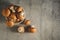 Royal champignons on a gray concrete background.