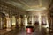 Royal City Palace Jaipur interior view of glass room with mirror and gold artwork at Rajasthan, India