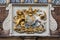 Royal Coat of Arms on the Exterior of Abbots Hospital in Guildford