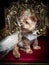 Royal dog portrait with jeweled crown, gown and gold throne